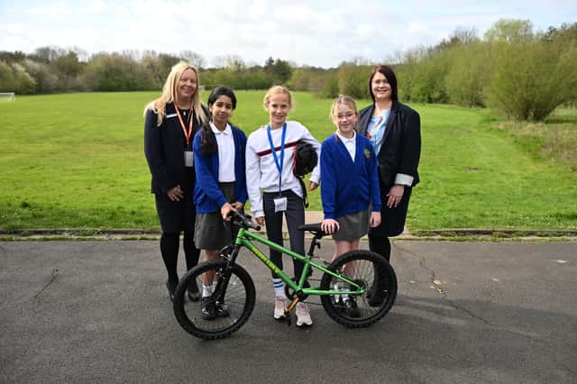 Left to right: Rachel Clarke, Assistant Manager, Co‑op Travel Walsall; Laibah Khan, age 9, pupil at Landywood Primary School; Fay Hoebeke age 11, pupil at OBS Juliana van Stolberg; Jessica Jones, aged 10, pupil at Landywood Primary School; Stacey Crawford, Travel Manager, Co‑op Travel Walsall.
