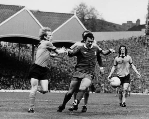 Willie Carr and Mike Bailey challenge Liverpool's Ray Kennedy.  Picture: Wolves Heroes