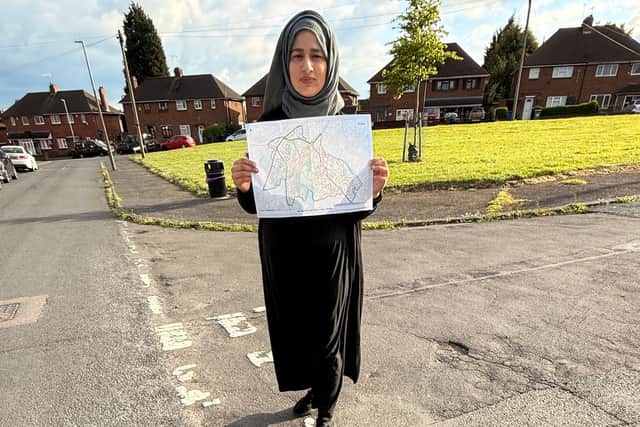 Cllr Shaneila Mughal with the pothole map for her ward. Picture Dudley Labour Party
