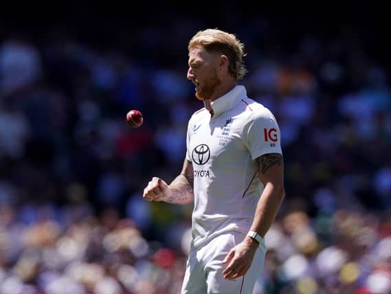 Ben Stokes tosses a ball in the air during the Ashes.