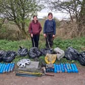 Volunteer litter pickers on Reservoir Road, Cannock Chase