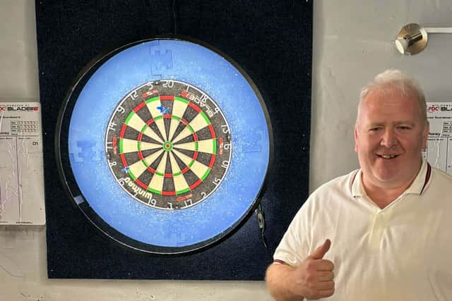 Junction's Mark Curley after pulling off his 6 Dart Leg.