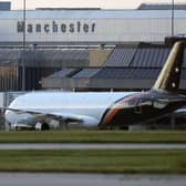 A plane at Manchester Airport carrying passengers that have been repatriated to the UK from cruise ship MV Hondius, which was hit by hantavirus