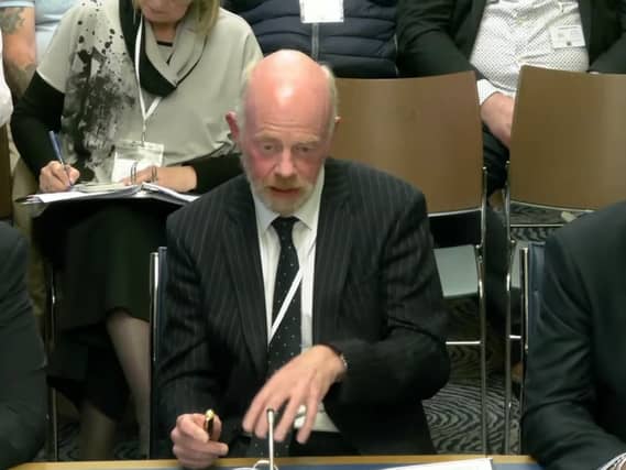 Mr Justice McAlinden