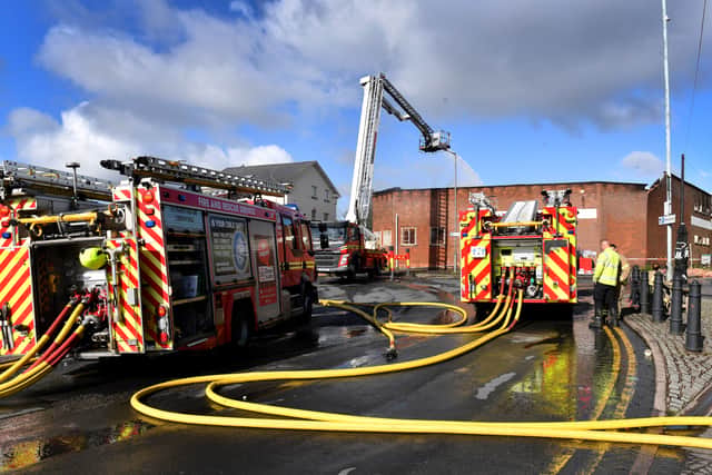 Fire crews are continuing to dampen down a huge blaze that erupted in a factory unit in Wolverhampton this morning (Thursday 14 May).