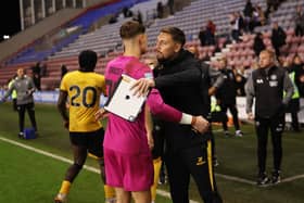 Congratulating Josh Gracey after an Under-21s fixture