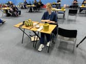 Students receiving vaccines and antibiotics from medical staff in the sports hall at the University of Kent campus in Canterbury