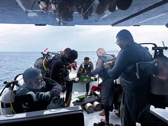 Divers on a boat