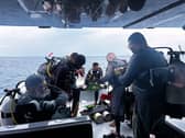 Divers on a boat
