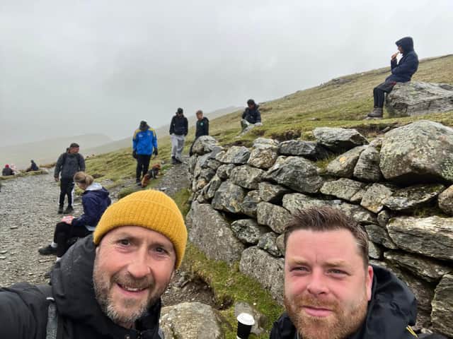 Coach Damian O'Connor (left) with Adam Watts
