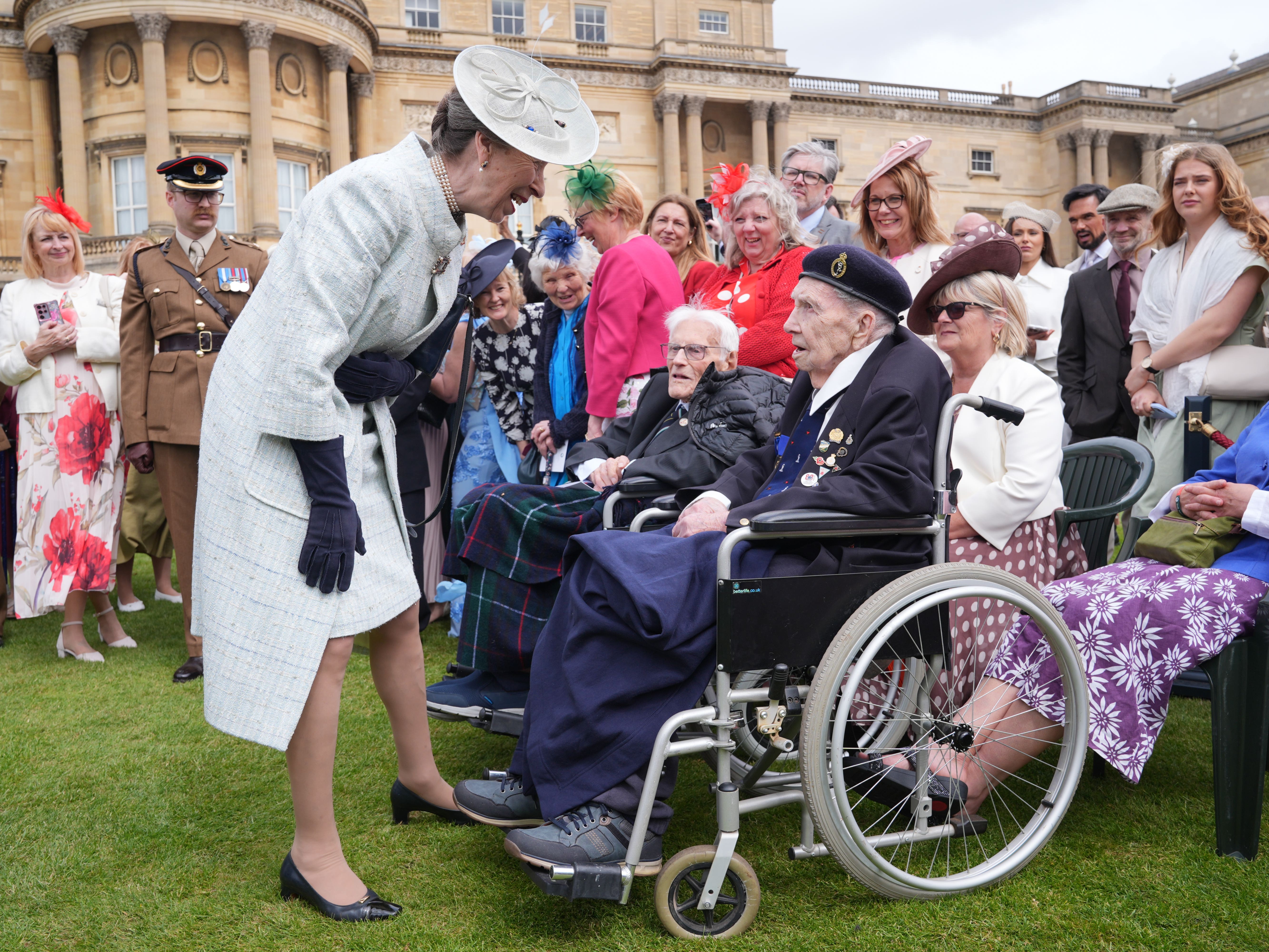 The Princess Royal speaking to veteran Robert Piper in the Buckingham Palace garden
