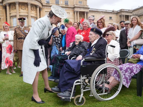 The Princess Royal speaking to veteran Robert Piper in the Buckingham Palace garden