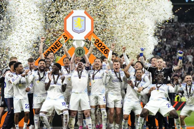 John McGinn lifts the Europa League trophy