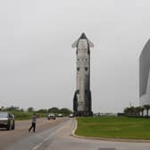 The latest version of SpaceX’s mega rocket Starship is rolled out to the launch pad in preparation for a test flight in Starbase, Texas