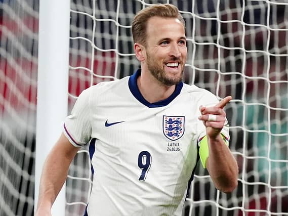 Harry Kane celebrates scoring for England