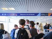 A queue of people at an airport
