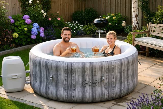 The Lay-Z-Spa Fiji AirJet inflatable hot tub seats up to four adults and features a bubble massage system.