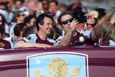 Unai Emery, Manager of Aston Villa, poses for a selfie on the bus during the Aston Villa trophy parade