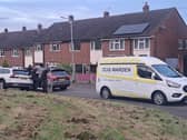 Armed police and a dog warden was seen at the scene of the incident today