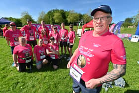 Adrian Hanson running in memory of his daughter: Rachie Hanson, with collegaues from Radnor Hills
