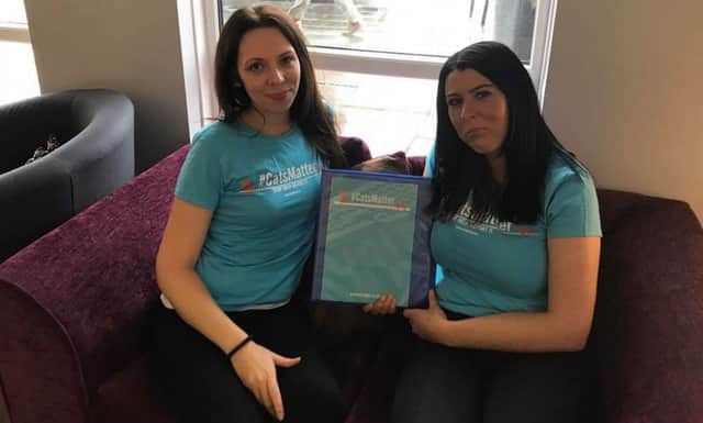 CoFounders Mandy and Tiya with a copy of the petition ready to hand in