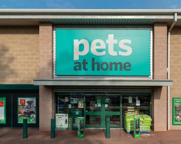 The storefront of the retailer Pets at Home on a retail park in Baguley, Manchester