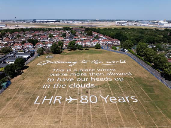 View from above of a field which has a poem writing on it