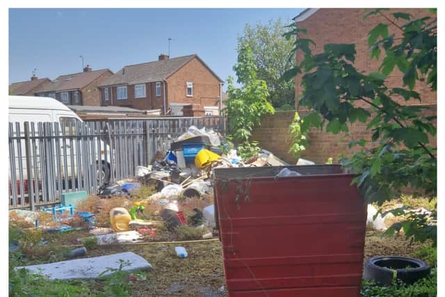 Huge amounts of rubbish has been piled up and left outside a closed down fish and chip shop in Wednesbury.