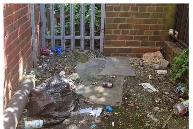 The rubbish outside the closed down Bobby’s Fish and Chip shop in Wednesbury.