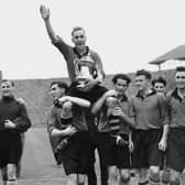 Jimmy Mullen celebrating with Wolves players after their 1949 FA Cup win