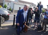 Jeffrey Donaldson walking past photographers at Newry Crown Court