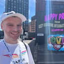 Ozzy Airport Campaigner Dan Hudson with his Birmingham Pride billborad