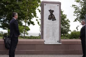 Liverpool chief executive Billy Hogan and Juventus' Peter Silverstone look at the new Heysel memorial at Anfield