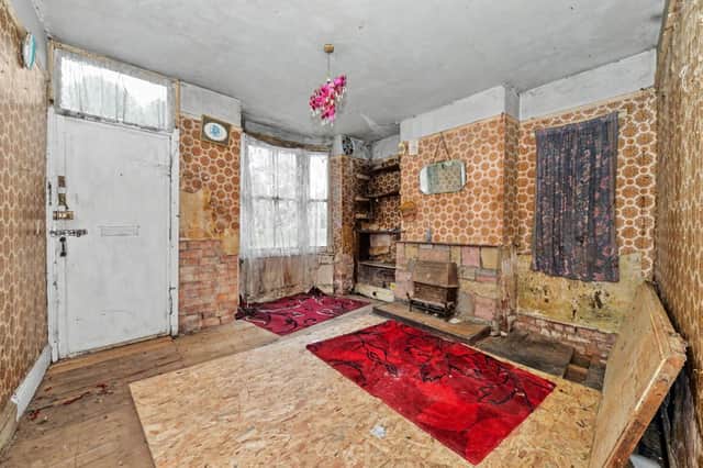 Interior view of the dilapidated end of terrace house with riverside views on Hylton Road, Worcester.