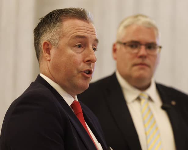 Education Minister Paul Givan and DUP leader Gavin Robinson MP speaking to the media about the proposed Education Inspections Bill in the Great Hall at Parliament Buildings, Stormont