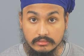 Handout mugshot of Vickrum Digwa