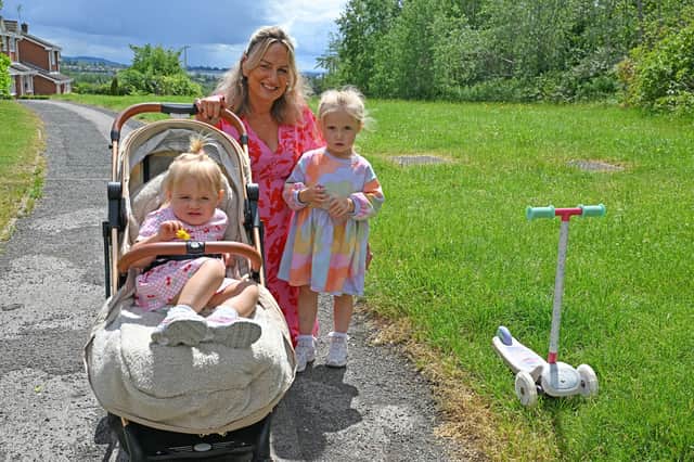 Tracey Thompson enjoys the nice weather with her grandchildren