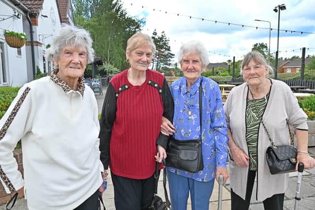 Daisy Turner, Margaret Shakespeare, Margaret Sharman and Sandra Waterfield are part of the friendly welcome in Milking Bank