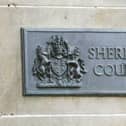 A sign for Edinburgh Sheriff Court
