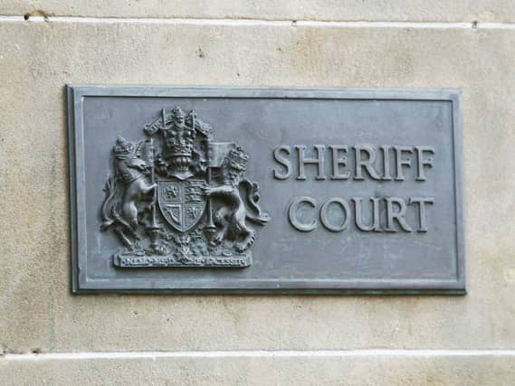 A sign for Edinburgh Sheriff Court