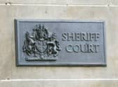A sign for Edinburgh Sheriff Court
