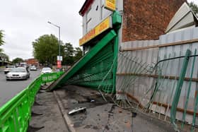 The scene at Lo's Garden takeaway, Princes End High Street, Tipton after a crash.