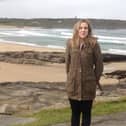 Natalie McNally near a beach