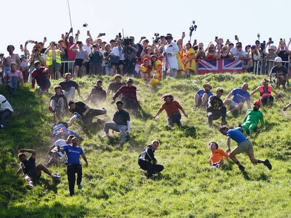 Participants in the first men’s downhill race