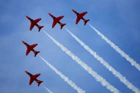 The Red Arrows go through one of their aerobatic displays at RAF Scampton on 12 November 12 2009.