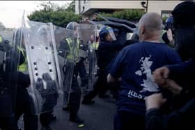 Police and protesters clashing in Southampton during a protest following the death of Henry Nowak