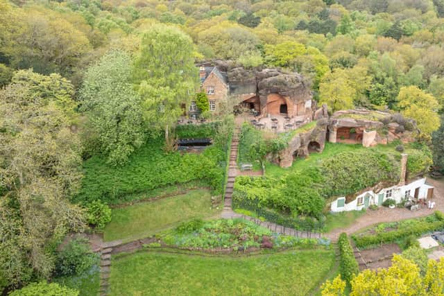 Aerial view of ther Kinver Rock Houses. On Kinver Edge there are several rock houses that have been carved out of the soft red sandstone. The most famous are the homes at Holy Austin Rock, now restored and open to visitors.