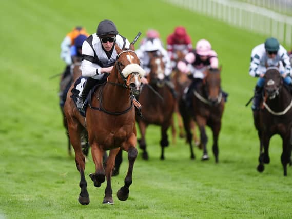 Hickory Lad wins at Epsom.