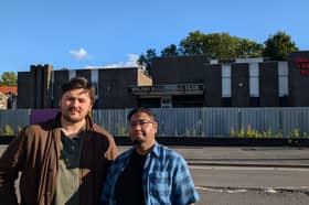 Councillors Ryan Priest and Kash Khan in front of the old Wilson Hall, Colley Gate