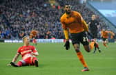 Ethan Ebanks-Landell celebrates a goal during his Wolves days